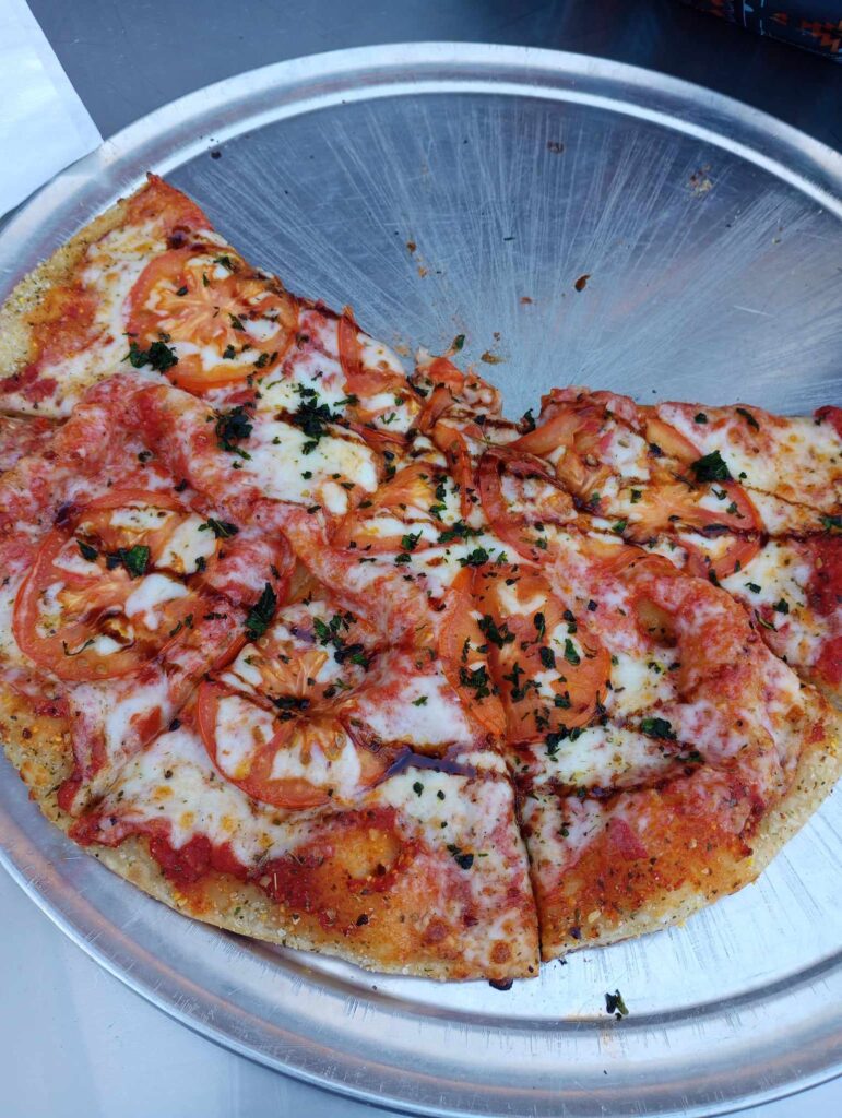 Tap & Putt has delicious pizza another other snacks.